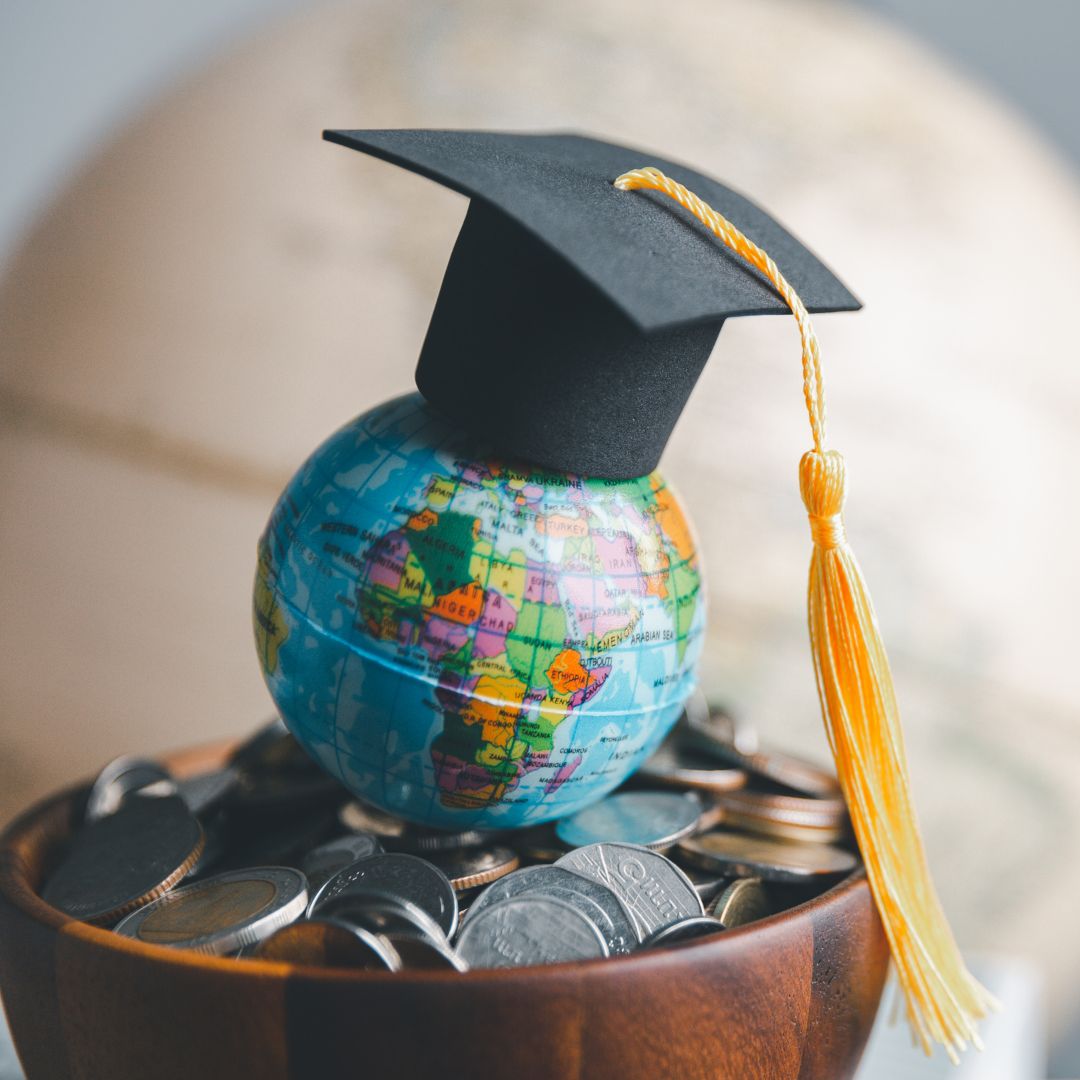 Graduation cap with Earth globe. Concept of global business study, abroad educational, Back to School. Education in Global world, Study abroad business in universities in worldwide. language study-widen