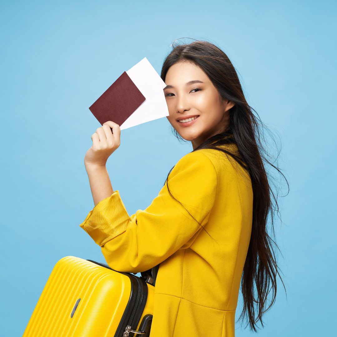 Happy Female Traveler Holding Passport and Suitcase-widen